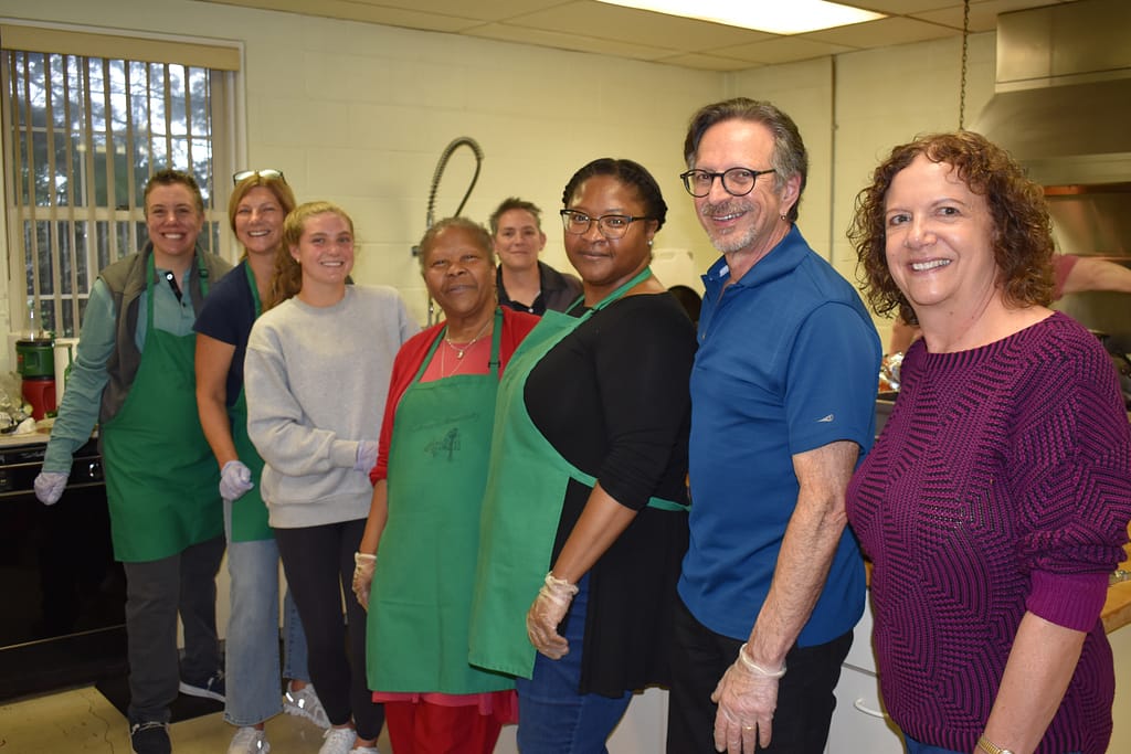 A group of volunteers working in the kitchen at our annual Spaghetti Dinner