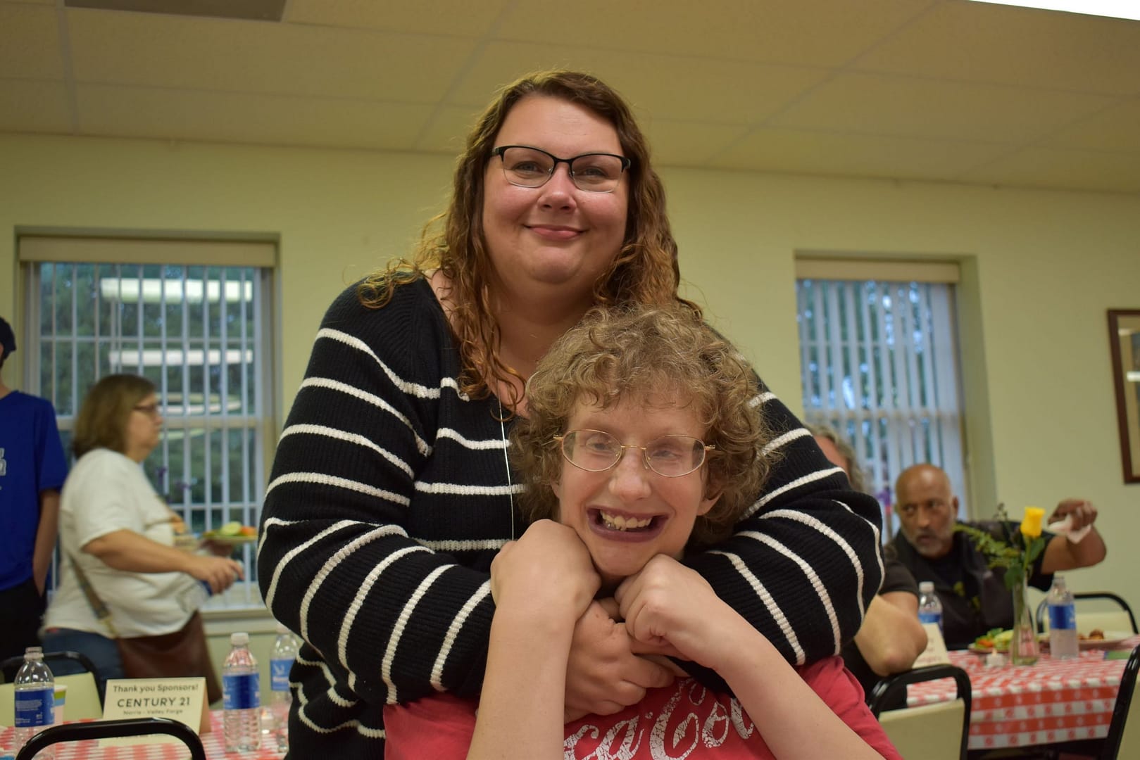 An advocate and her partner smile because they have a special relationship